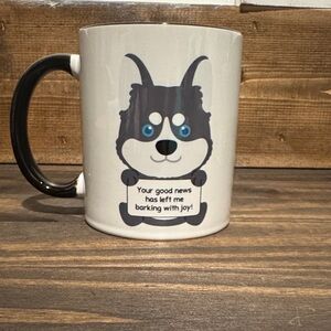 Dog Mug w/Black Handle with quote “Your good news has left me barking with joy!”
